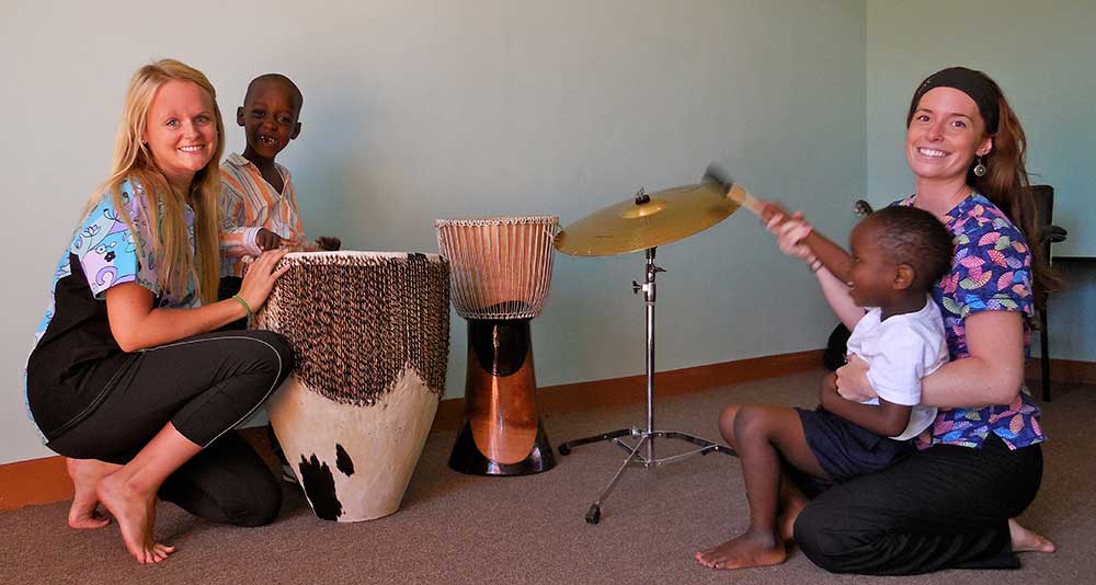 A music therapy session with drums and cymbals